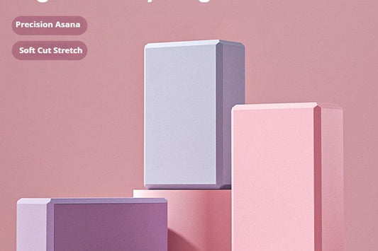 Yoga blocks in a soft pink studio — affordable yoga accessories for beginners