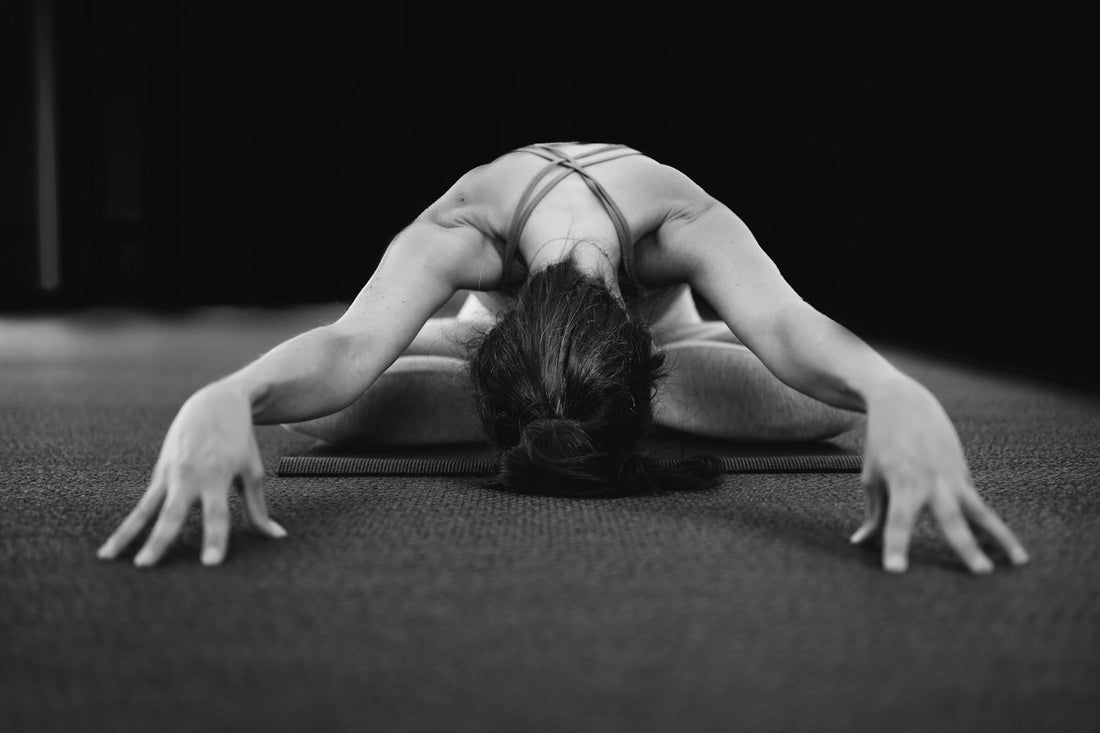 Deep stretch on a yoga mat — cork vs rubber vs PVC yoga mats compared
