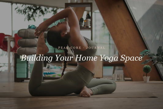 Woman practicing pigeon pose in a bright home yoga space