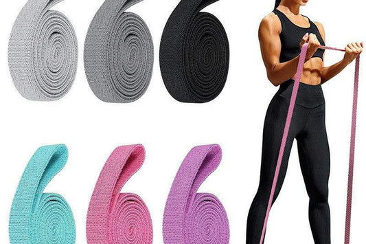 Woman exercising with a 2m yoga stretch band — how to use a yoga strap