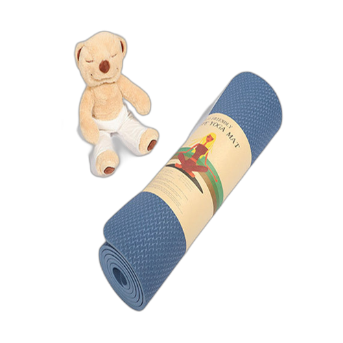 Rolled non-slip beginner yoga mat in soft blue