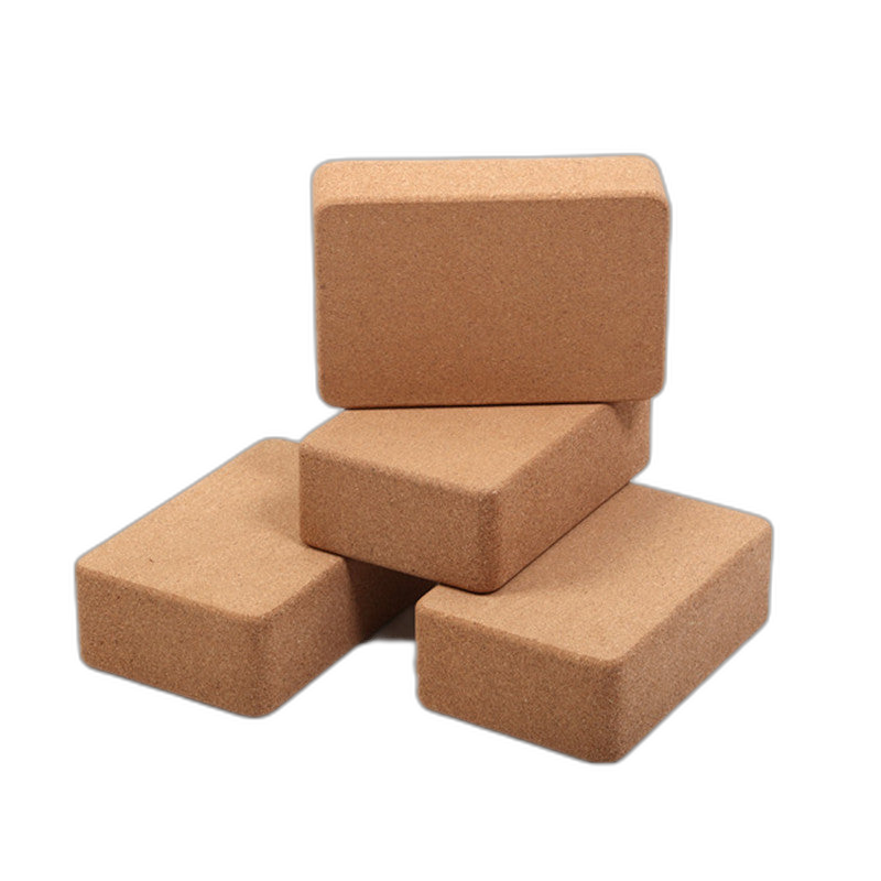 High-density cork yoga bricks stacked in a set